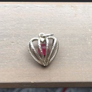 Silver necklace charm